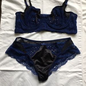 Lacy indigo and black bra and panty set.